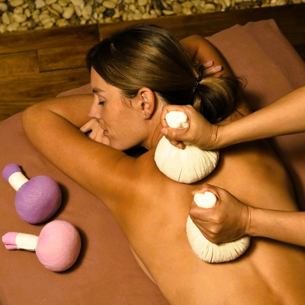 ritual massage with herbal balls